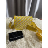 Dámska crossbody kabelka Tommy Hilfiger AWQAW yellow