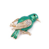 Brošňa s brúsenými kamienkami vtáčik - zelená pastelová