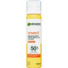 Garnier Vitamin C Brightening Over Make-Up UV Mist SPF50+ dlhotrvajúca rozjasňujúca opaľovacia h ml a na tvár 75 ml