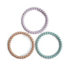 Mushie náramkové hryzátko zo silikónu PEARL lilac-cyan-soft-peach
