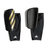 Futbalový chránič ADIDAS-TIRO SG COM BLACK/GOLDMT/WHITE Čierna S 2026