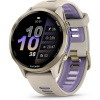 Garmin Forerunner 970 zlaté/zlatá titánová lunet s béžovo-indigovým polopriehľadným remienkom
