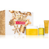 Clarins Tonic rozjasňujúci peeling s revitalizačným účinkom 250 g + hydratačný balzam s revitalizačným účinkom 30 ml + relaxačný telový olej s rastlinnými extraktmi 30 ml kozmetická sada