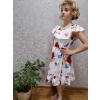 Dievčenské šaty biele s kvetmi Veľkosť: 98/104