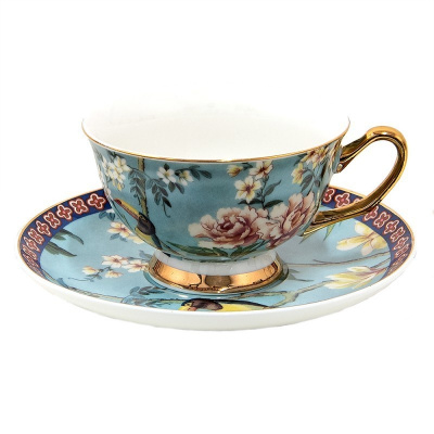 Clayre & Eef Modrá porcelánová šálka s tanierikom s kvetmi a Tukanom - 12*10*6 cm / Ø 15*2 cm / 200 ml