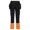 PORTWEST DX457 HI-VIS CRAFT / Reflexné pracovné nohavice do pása s odnímateľným puzdrom - HV oranžová UK 30/EU 46