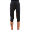 Dámské větruodolné legíny CRAFT ADV Essence Wind Tights černá s oranžovou Velikost: XL