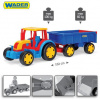 Obrovský traktor WADER 66100 s prívesom
