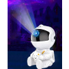 Sedící Kosmonaut- otočný světelný projektor noční oblohy a polární záře.