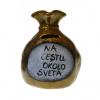 Pokladnička s nápisom - na cestu okolo sveta