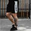 Šortky Vertical Black - GymBeam barva: černá, velikost: L